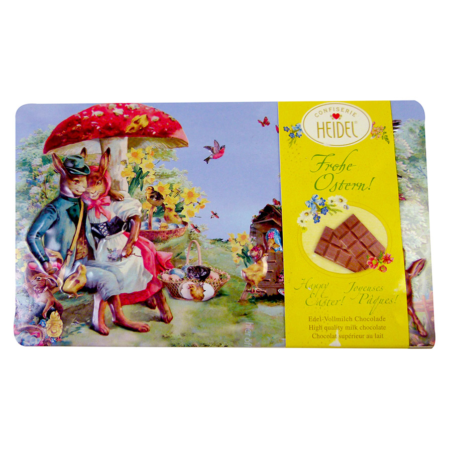 Boîte Nostalgie motif relief Paques garnie de 9 tablettes de chocolat superieur au lait