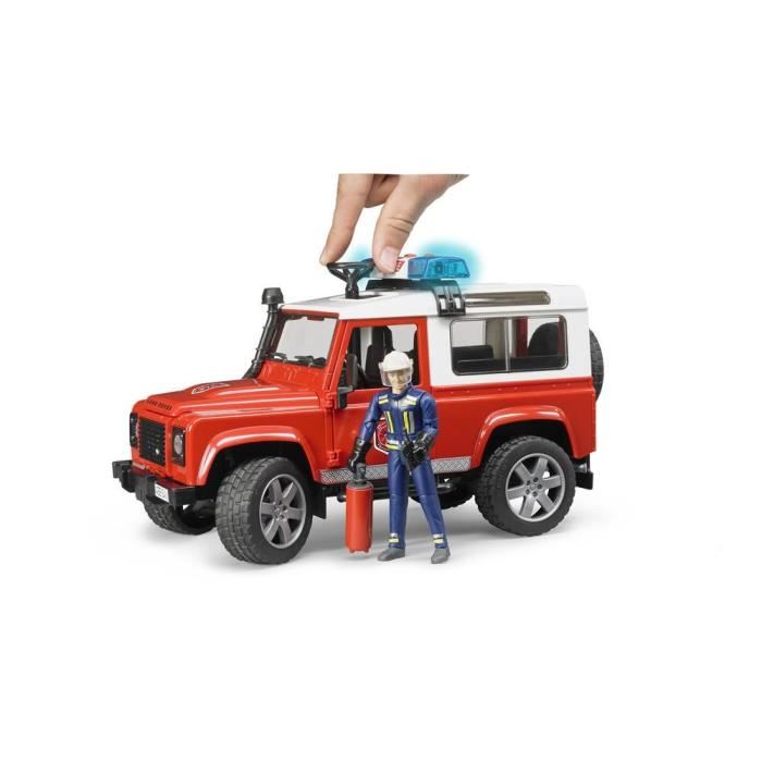 Vehicule De Pompiers Land Rover Avec Pompier